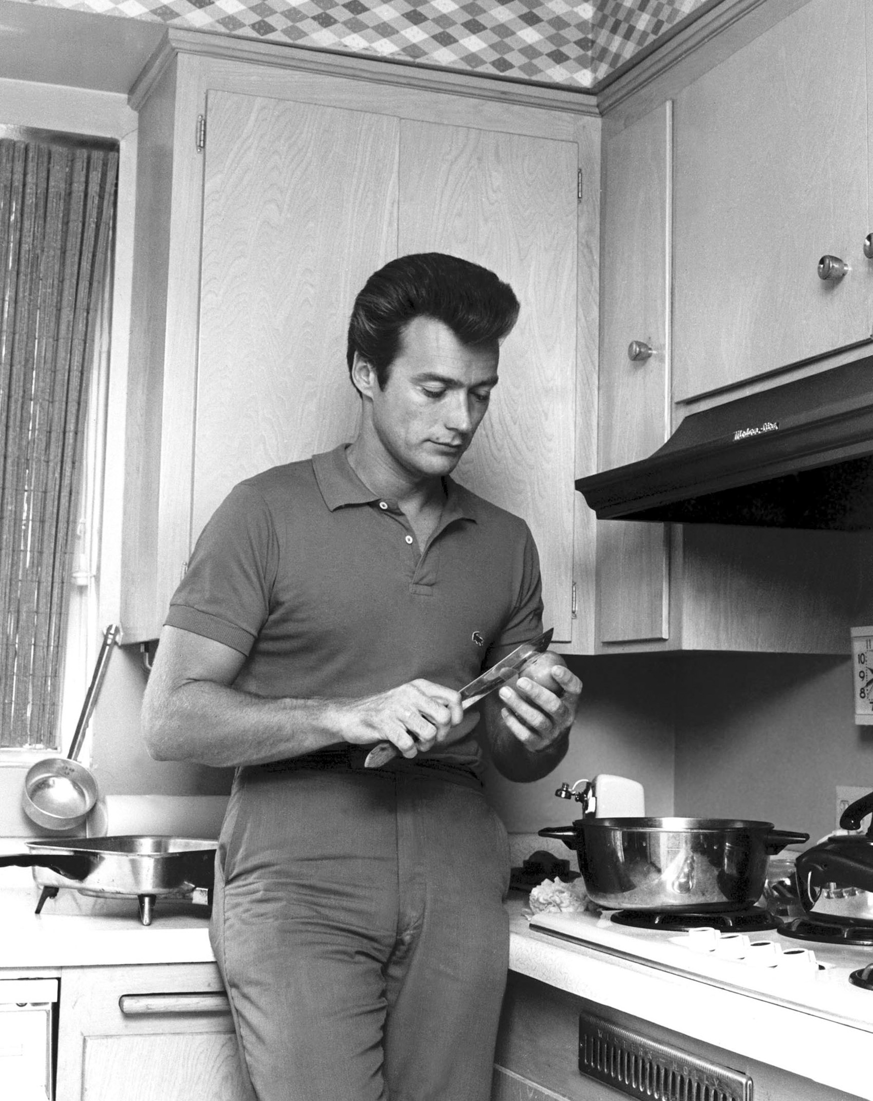 CLINT EASTWOOD at home in California prepped-out in an old Izod ...