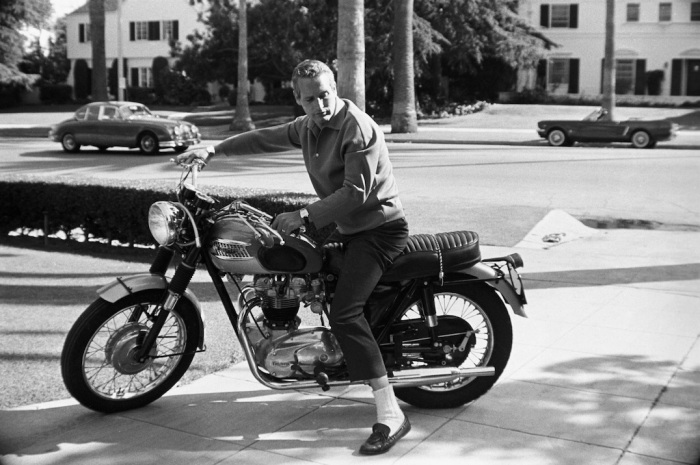 Paul Newman on his Triumph motorcycle at home, 1965. photo  © David Sutton