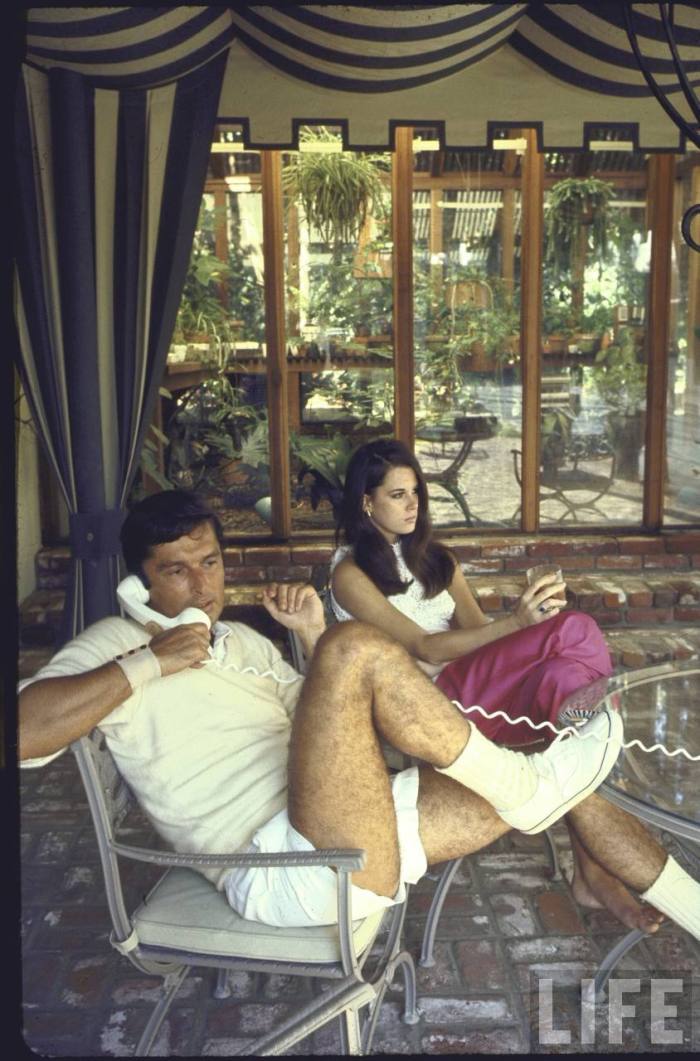 Film director Robert Evans and girlfriend Libby Boehmer at home-- Beverly Hills, CA 1968.